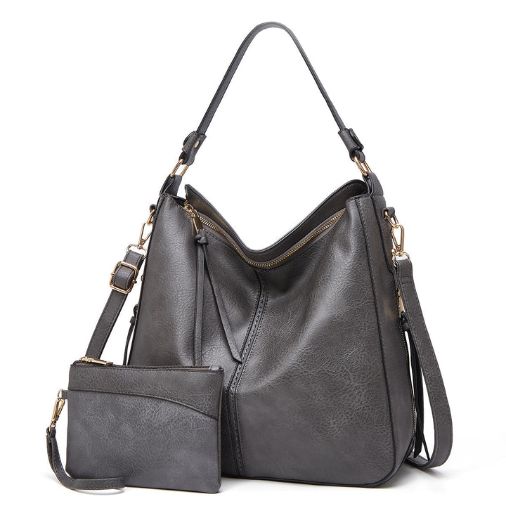 Ersilia™ - Elegant leather bag with large capacity and side pockets