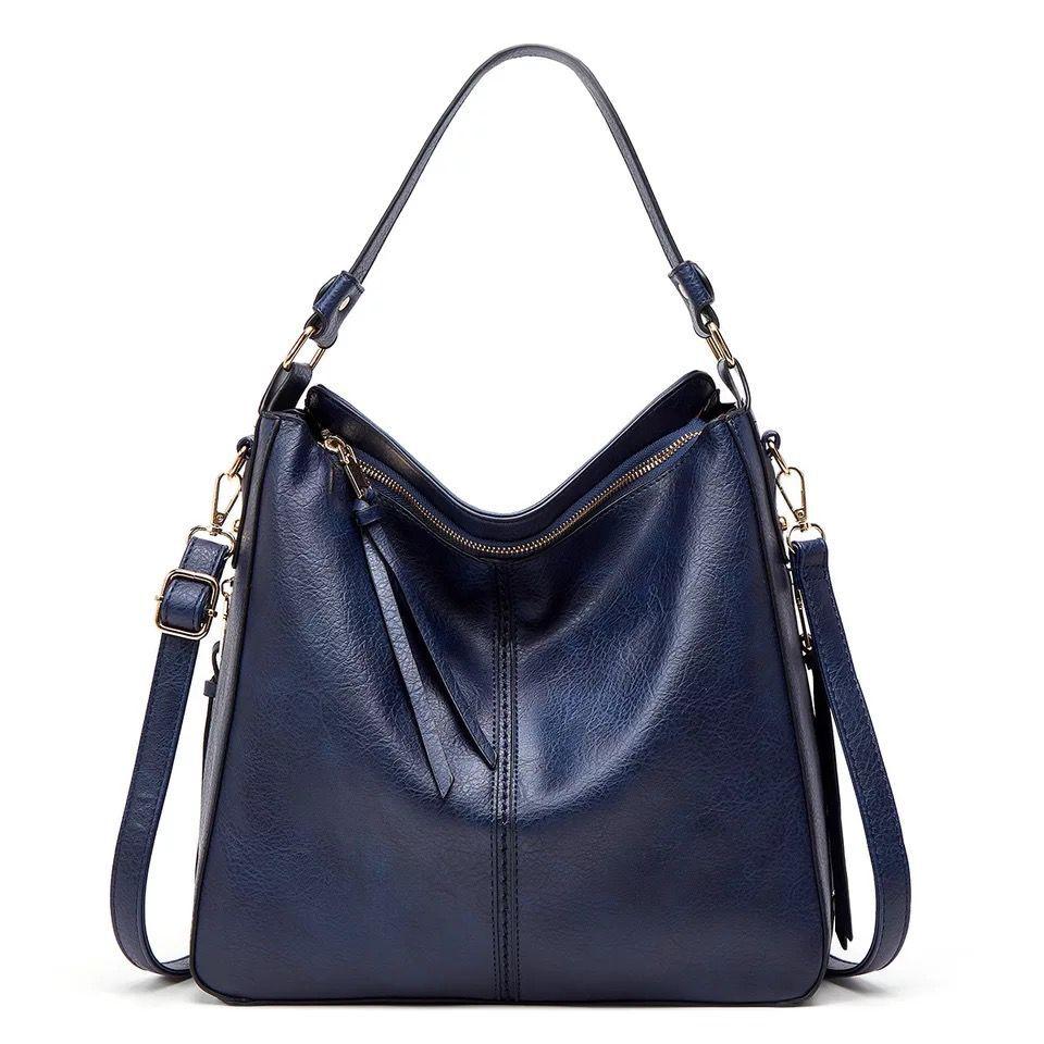 Ersilia™ - Elegant leather bag with large capacity and side pockets