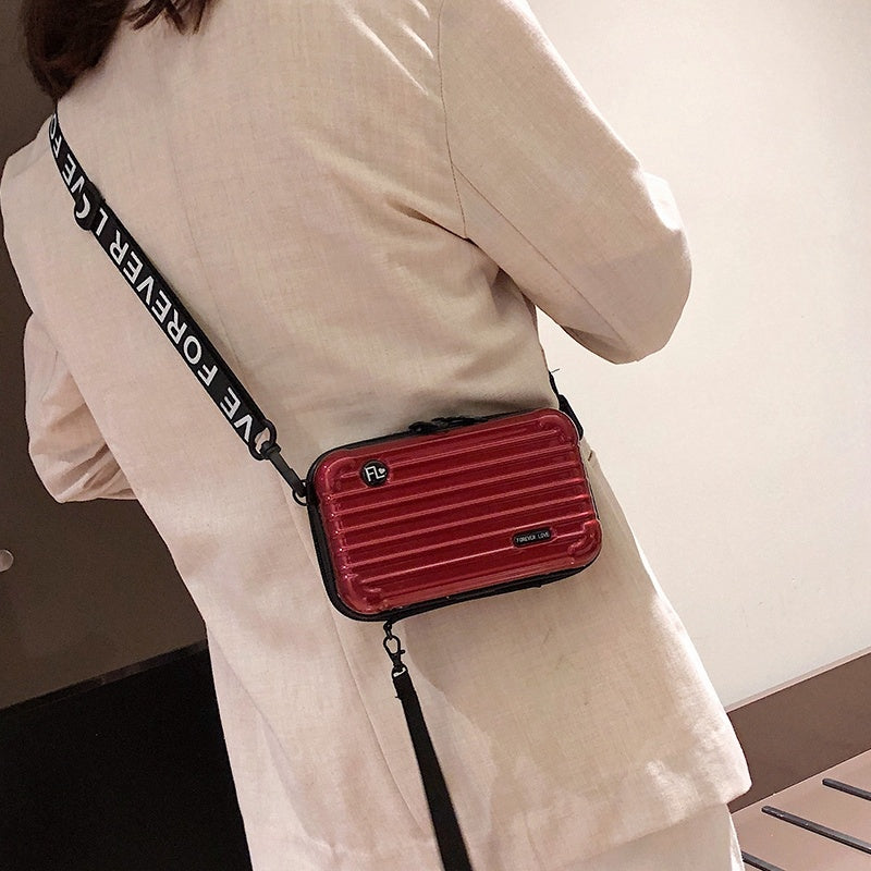 NOSTELA™ - Mini suitcase crossbody bag